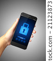 Hand holding Smartphone lock screen 21123873