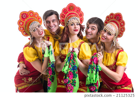 Dancer team wearing a folk costumes isolated on 21125325