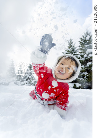 A boy playing in a snow park 21126900