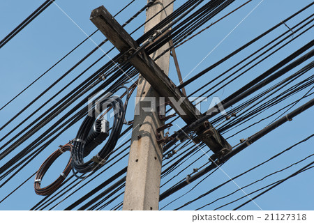 Messy power lines on electric pole Messy power lines on electric pole 21127318