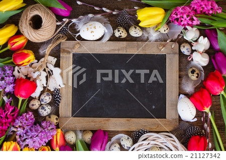 Spring flowers with easter eggs Spring flowers with easter eggs 21127342