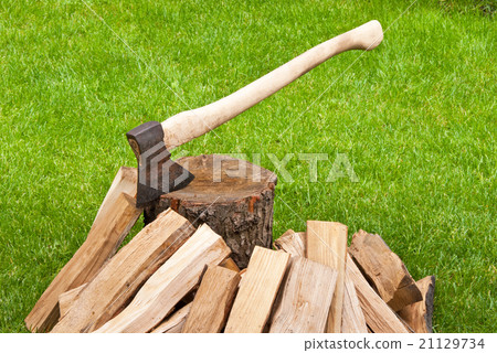 old used ax with a log old used ax with a log 21129734