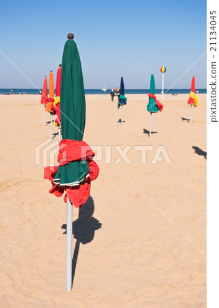 The famous colorful parasols on Deauville beach 21134045