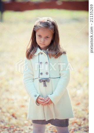 portrait of the sad girl in park portrait of the sad girl in park 21135269