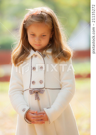 portrait of the sad girl in park portrait of the sad girl in park 21135272
