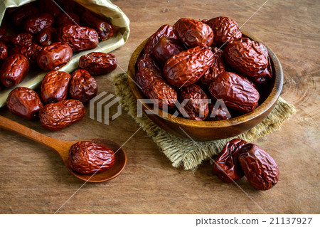 Dried jujube fruits on wooden table 21137927