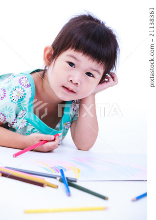 Child lie on floor and drawing on paper. On white Child lie on floor and drawing on paper. On white 21138361