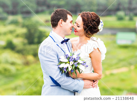 bride and groom with wedding bouquet bride and groom with wedding bouquet 21138648