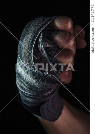 Close-up hand of muscular man with bandage 21142778
