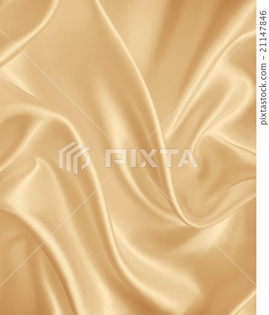 Smooth elegant golden silk or satin as background. 21147846
