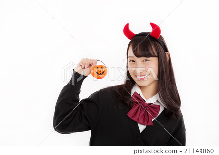 Cute girls with Halloween pumpkin dolls Cute girls with Halloween pumpkin dolls 21149060