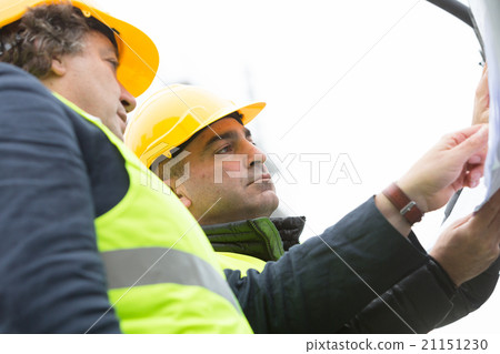Engineer and constructor worker at construction Engineer and constructor worker at construction 21151230