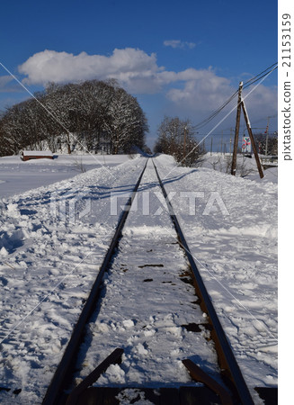 Country snow scenery and railway tracks 21153159