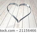 Forks heart on wood background 21156466