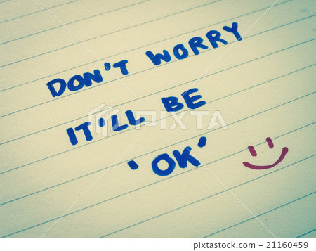 Hand writing on opened notebook 21160459