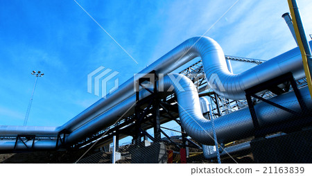 Steel pipelines and valves against blue sky Steel pipelines and valves against blue sky 21163839