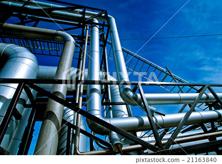 Steel pipelines and valves against blue sky Steel pipelines and valves against blue sky 21163840