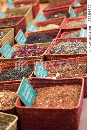 Market counter with different herbs and tea 21164492
