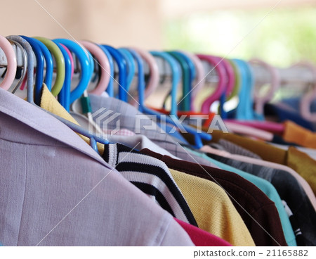 row of shirt hanging on outdoor hanger row of shirt hanging on outdoor hanger 21165882