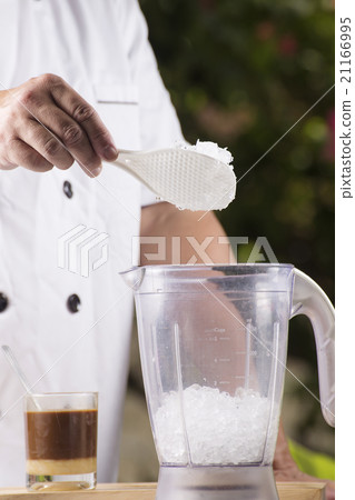 Chef putting grind ice 21166995