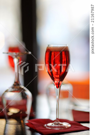 Glass with French alcohol drink Kir Royal Glass with French alcohol drink Kir Royal 21167987