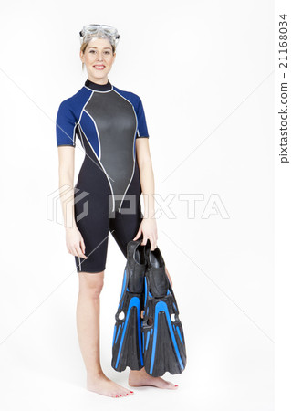 young woman wearing neoprene with flippers young woman wearing neoprene with flippers 21168034
