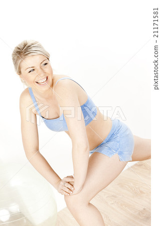 young woman doing excercises young woman doing excercises 21171581