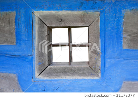 Blue wall of the house with a window 21172377