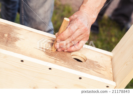 Birdhouse made of wood is under construction Birdhouse made of wood is under construction 21178843