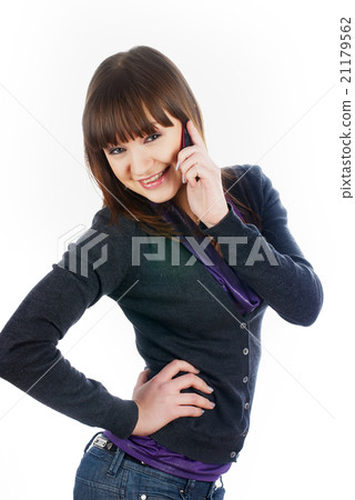 Beautiful brunette girl talking on phone Beautiful brunette girl talking on phone 21179562