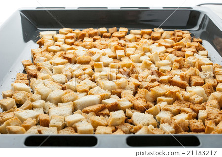 Small croutons on a baking tray horizontal 21183217