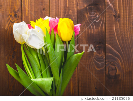 Bouquet Of Tulips In Front Of Spring Scene  21185056