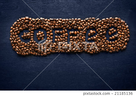 Inscription of coffee beans on the dark background Inscription of coffee beans on the dark background 21185136