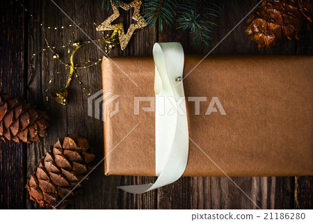 Homemade gift with christmas fir tree and cone  21186280