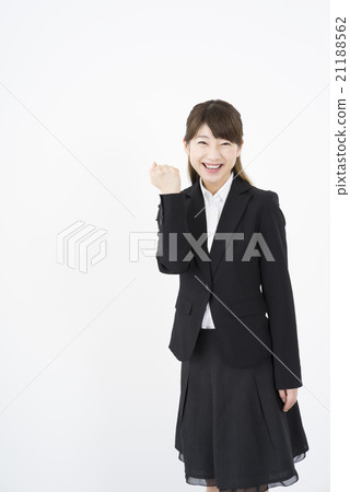 穿著商務套裝的迷人微笑是一個美妙的女士“前面”膽量姿勢請留下它！我會盡我所能。挑戰勝利 21188562