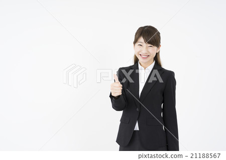 穿著西裝的迷人笑容是一個美妙的女人“前線”成功的成功。小心! 穿著西裝的迷人笑容是一個美妙的女人“前線”成功的成功。小心! 21188567