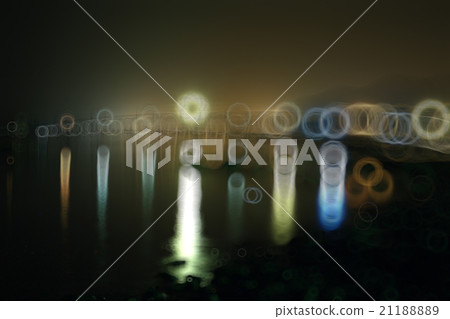 blurred background night city lights flashing drops blurred background night city lights flashing drops 21188889