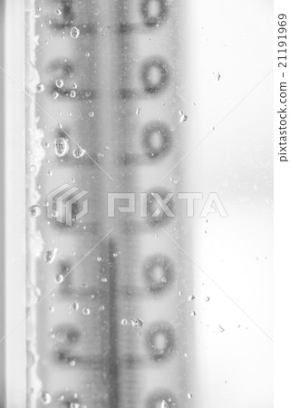Thermometer for window glass with raindrops 21191969