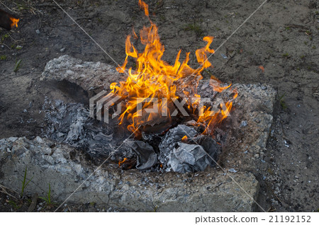 Burning office white paper in bonfire Burning office white paper in bonfire 21192152