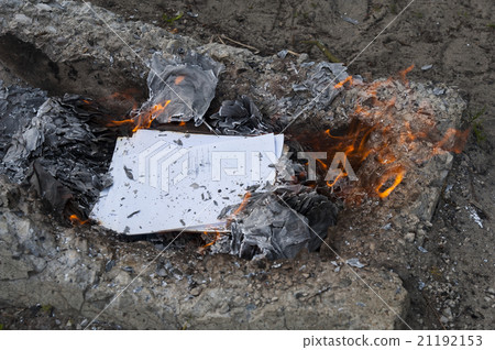 Burning office white paper in bonfire 21192153