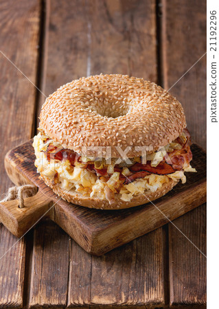 Bagel with bacon and scrambled eggs Bagel with bacon and scrambled eggs 21192296