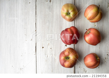 Summer red apples on white boards Summer red apples on white boards 21194358