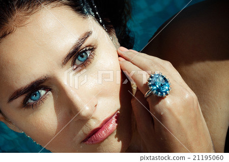 Woman at a water blue eyes sapphire Woman at a water blue eyes sapphire 21195060