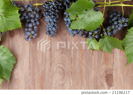 Red grape on wooden table 21196217