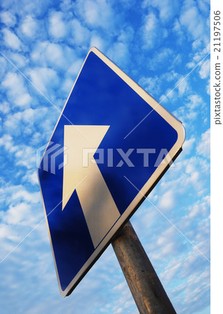 one way sign under blue sky 21197506