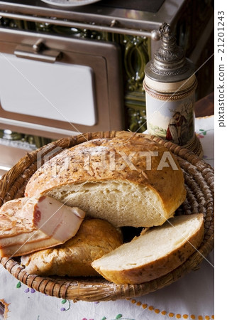 Homemade bread and bacon in a basket Homemade bread and bacon in a basket 21201243