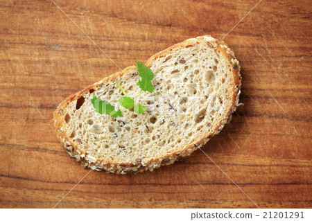 Slice of whole grain bread 21201291