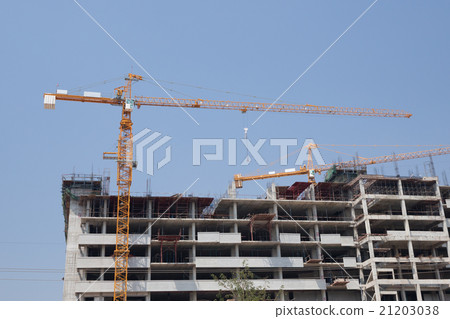 Crane under construction building 21203038
