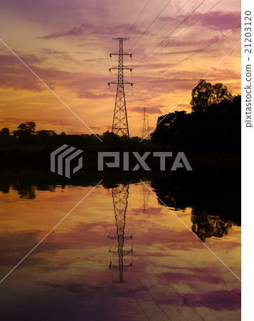 Silhouette of high voltage post with water Silhouette of high voltage post with water 21203120