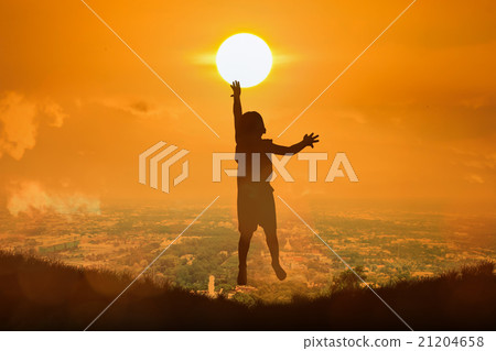boy happy jumping touch the sun boy happy jumping touch the sun 21204658